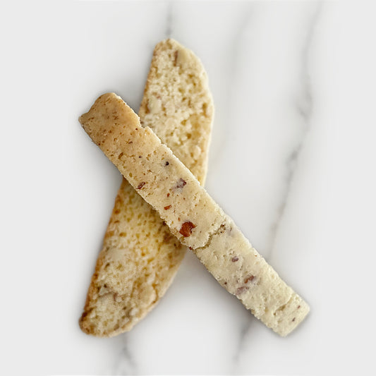 Sorelle Biscotti LLC Beta's traditional anise almond biscotti cookie on marble